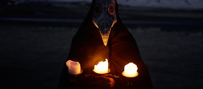 Plague Man with candles